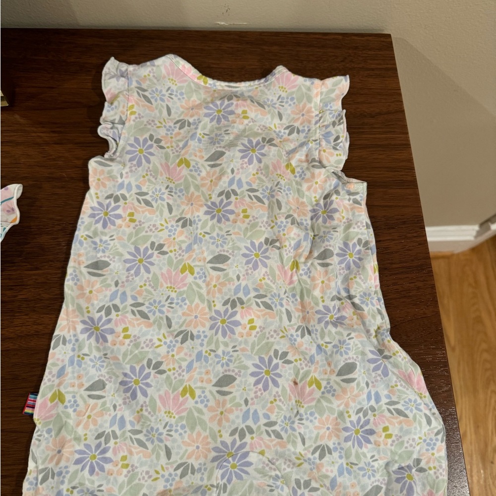 1 Magnetic and me romper. Only worn a few times.